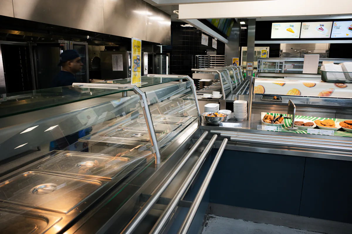 A stainless steel institutional serving line